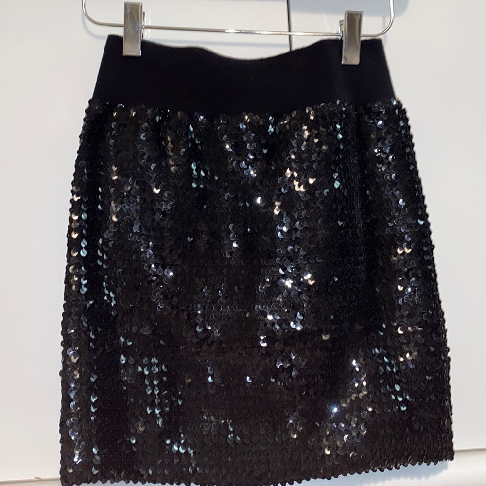 New without tags never worn Lily White sequin mini-skirt with elastic waist